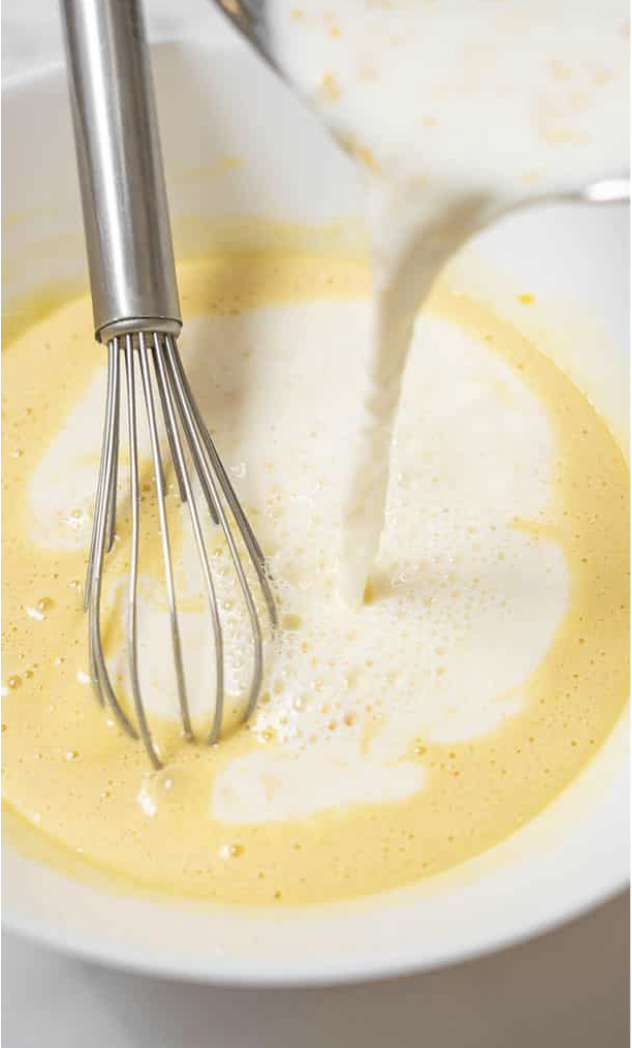 Mixing egg and milk mixture